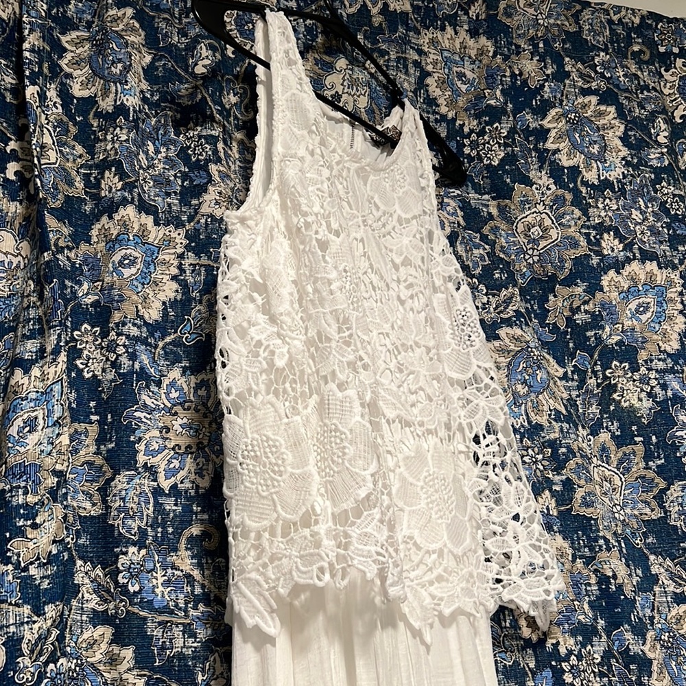 I can’t tell what the brand says but you should give it a shot at reading it.